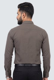 Back view of men's dark brown textured button-up shirt with long sleeves