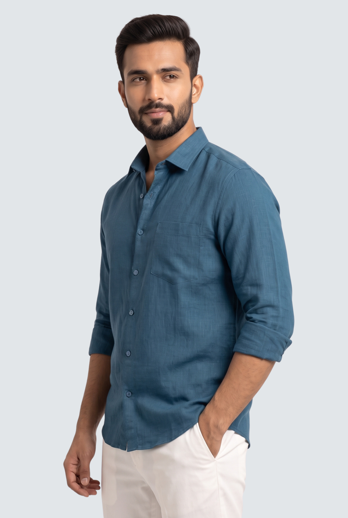 Men's Rama linen shirt in teal blue, side view, button-front with chest pocket