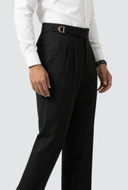 Men's black casual trousers with belt buckle, pleated front, and relaxed fit