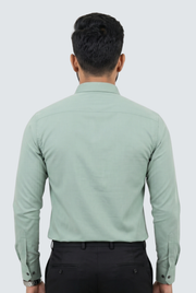 Men's pista green long-sleeve shirt with plain back, no visible print