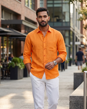 Orange linen shirt with button front and chest pocket, long sleeves