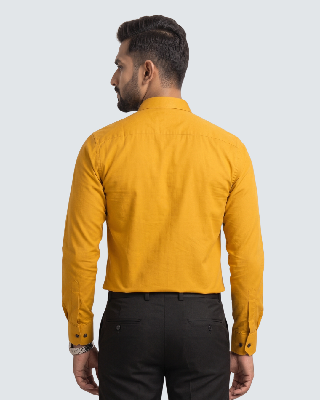 Yellow cotton button-up shirt, back view with long sleeves and buttoned placket