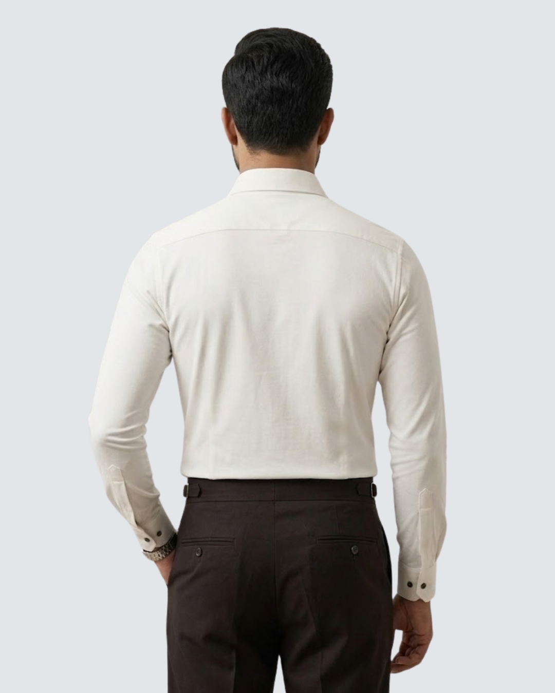 White button-up shirt back view with long sleeves and yoke seam
