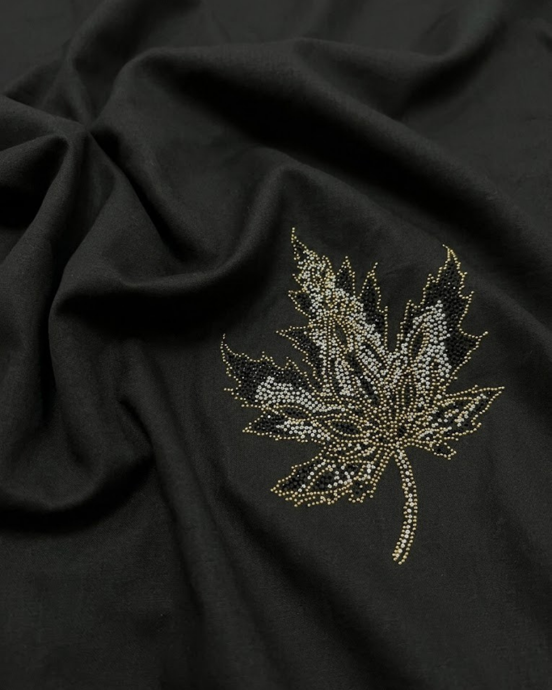 Black cotton satin lycra shirt with gold leaf embroidery detail on chest.