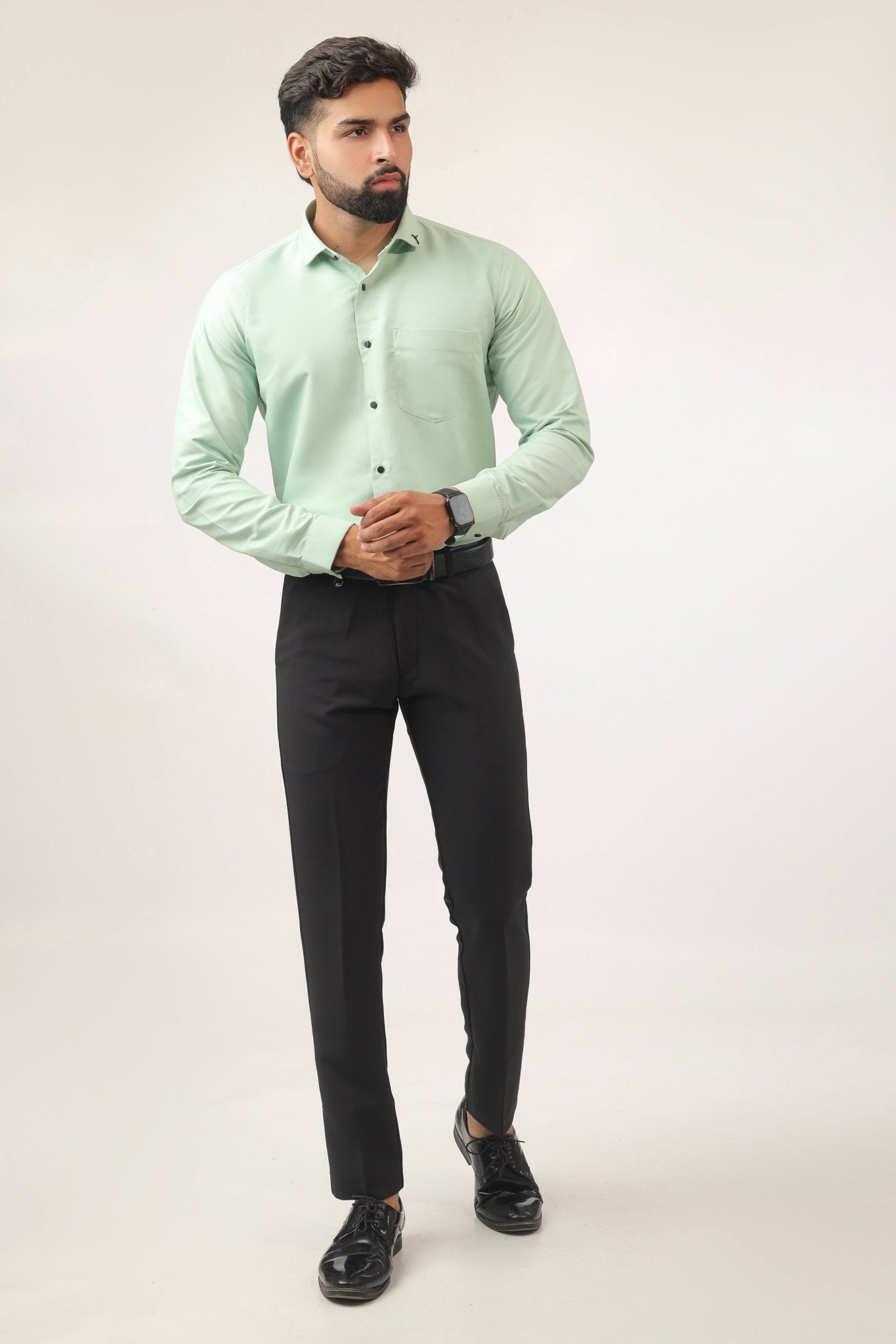 Model wearing mint green shirt – summer-ready style