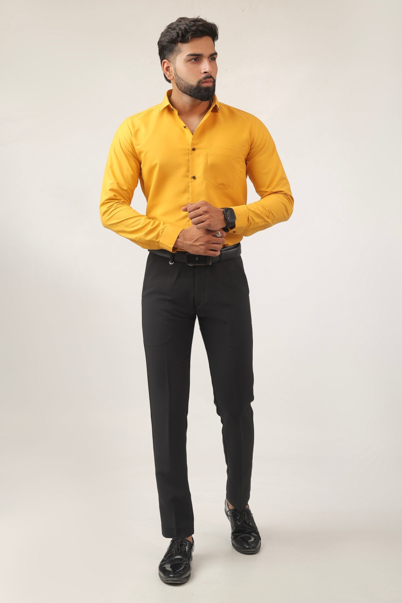 Model wearing mustard yellow shirt – bold festive look