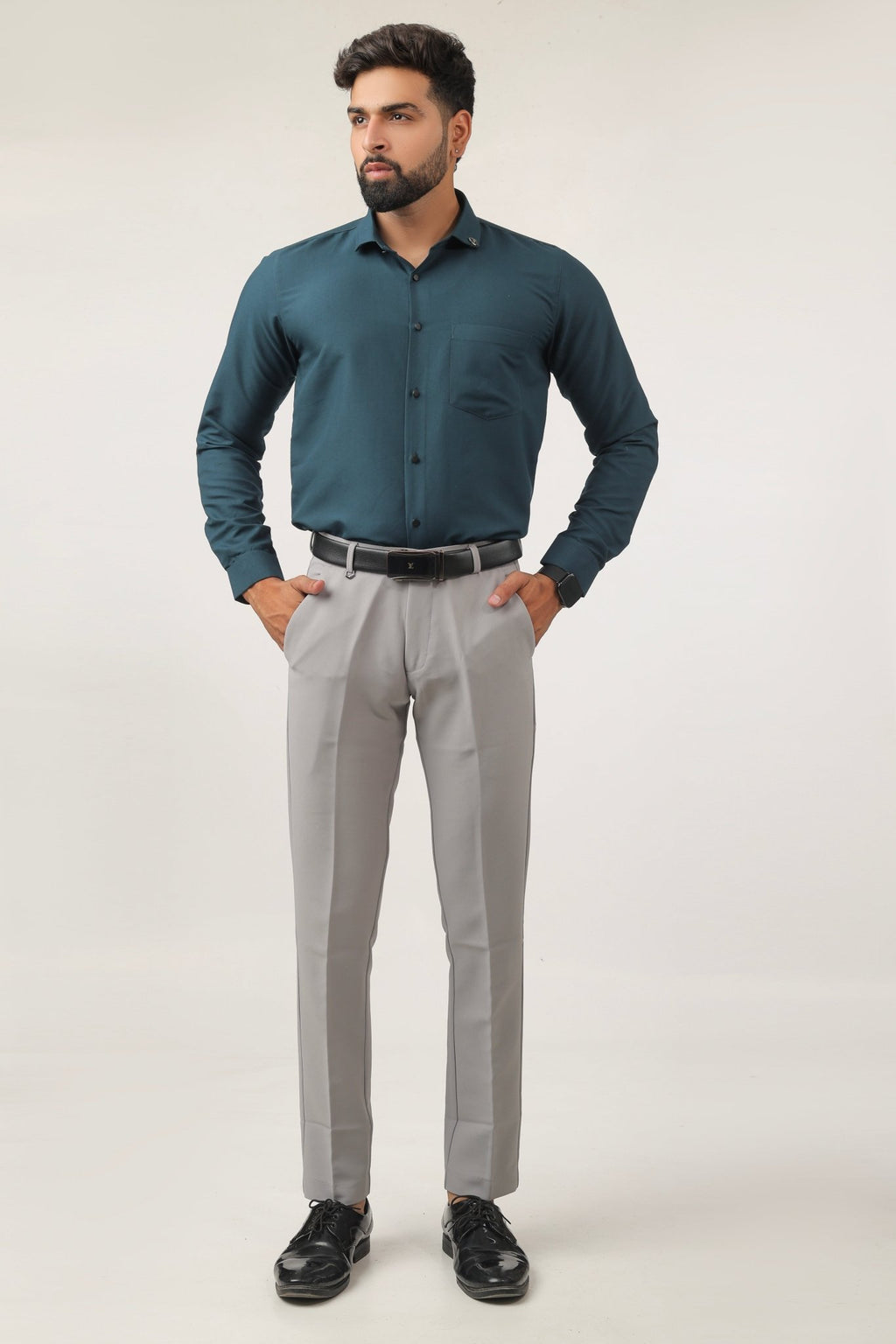 Model wearing teal green shirt – casual and bold look