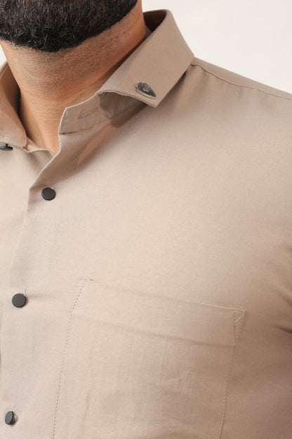 Close-up of beige shirt fabric – soft cotton texture
