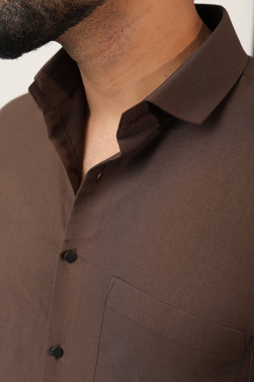 Close-up of brown shirt fabric – soft cotton texture