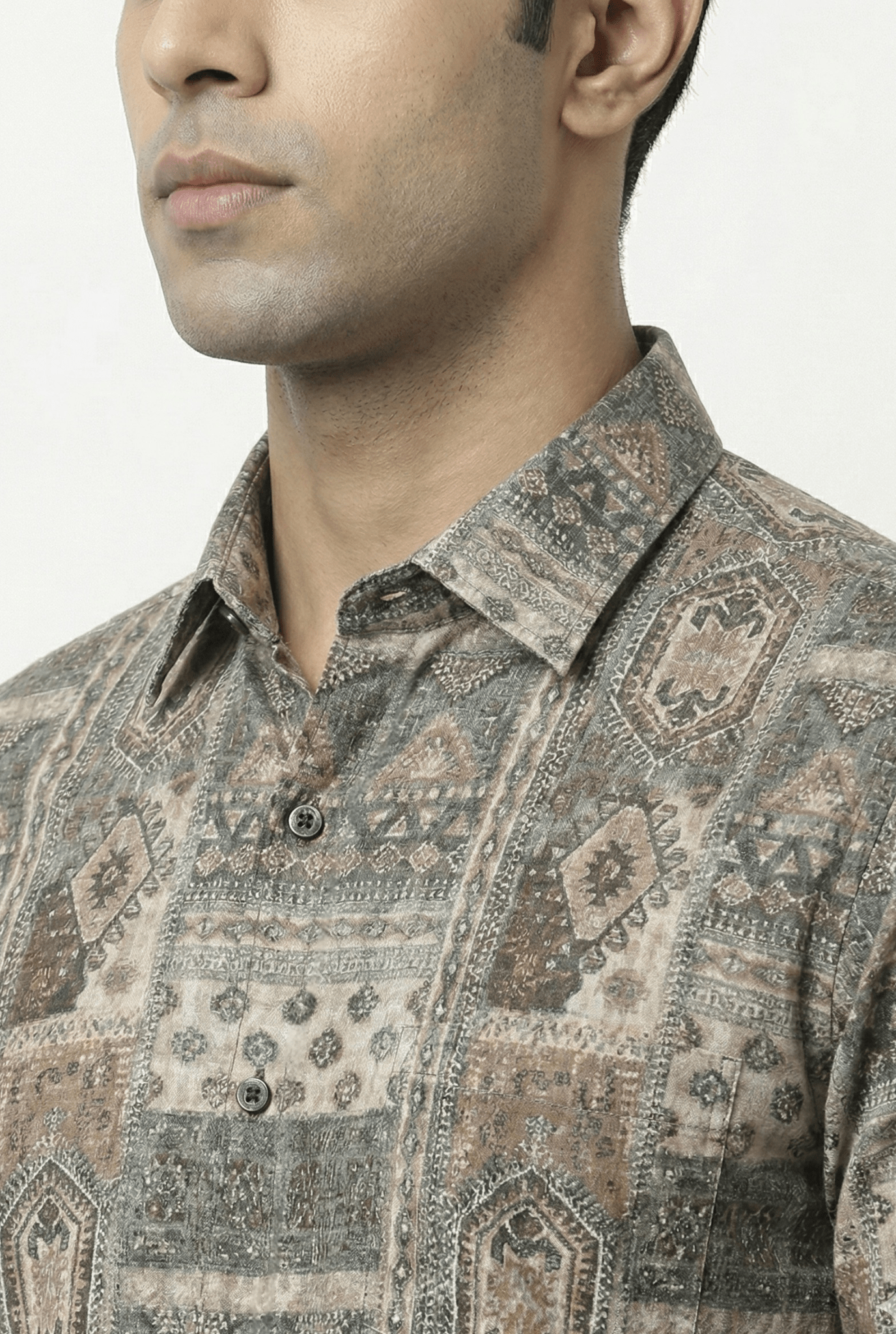 “Close-up of multicolour printed shirt showing pattern and fabric details”