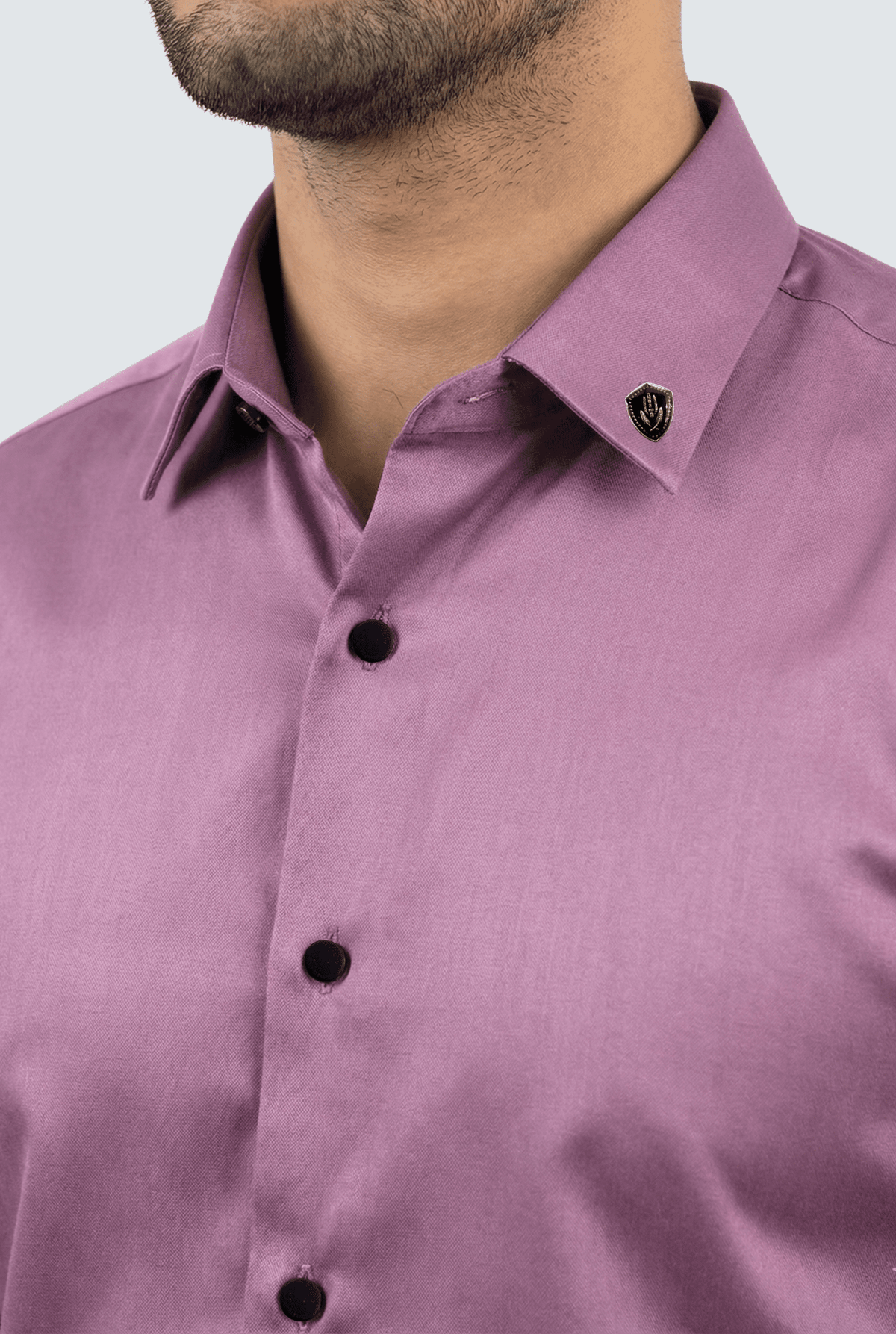 Lavender satin shirt collar and placket with black buttons and small crest detail.