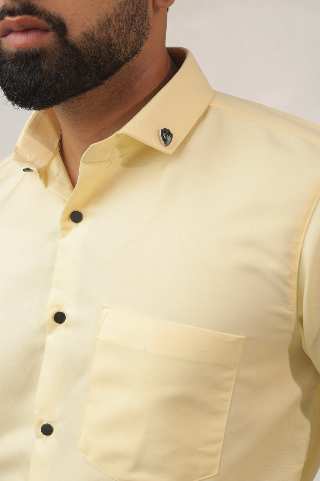 Close-up of lemon shirt fabric – lightweight cotton texture