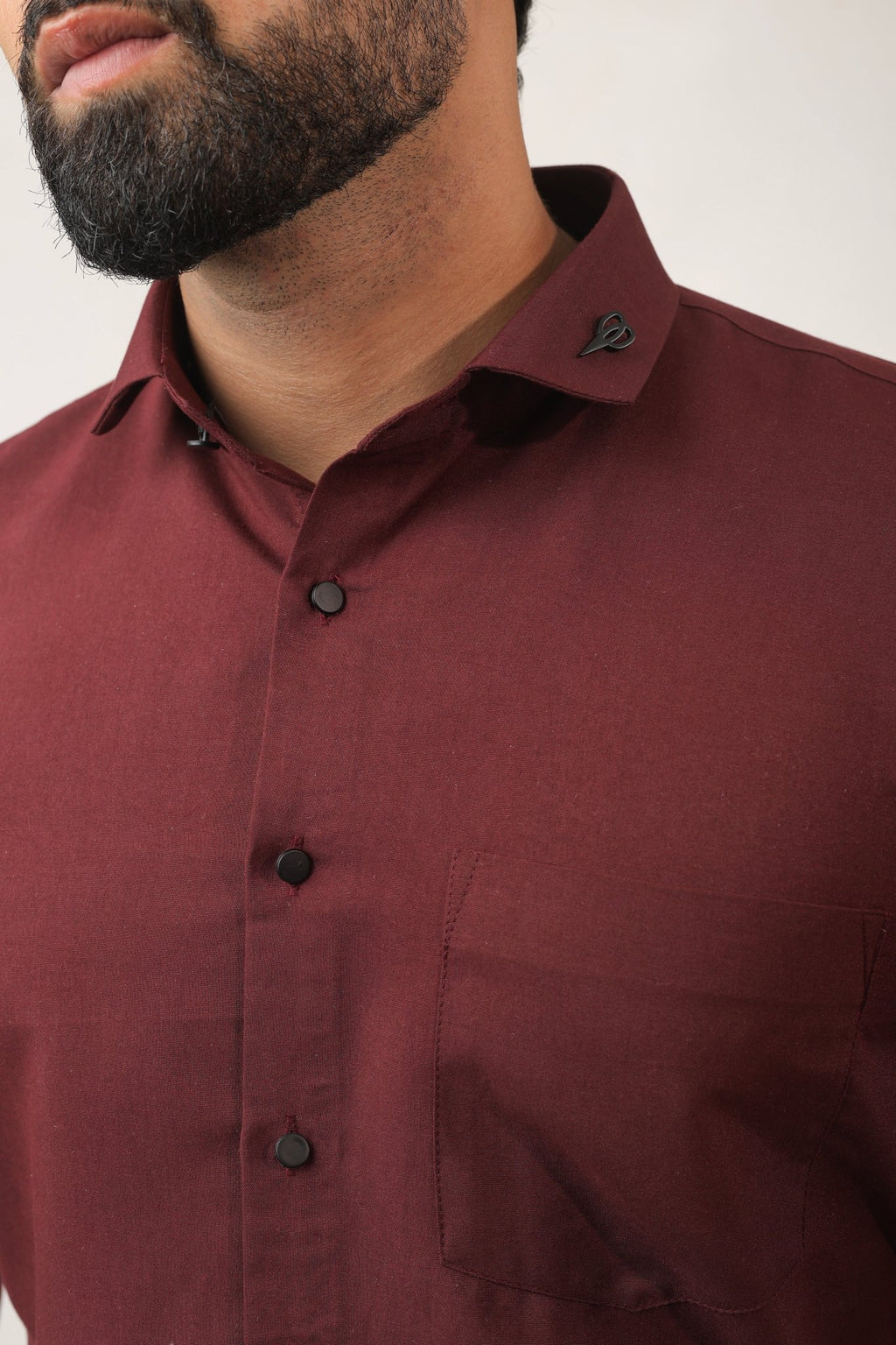 Close-up of maroon shirt fabric – soft breathable cotton