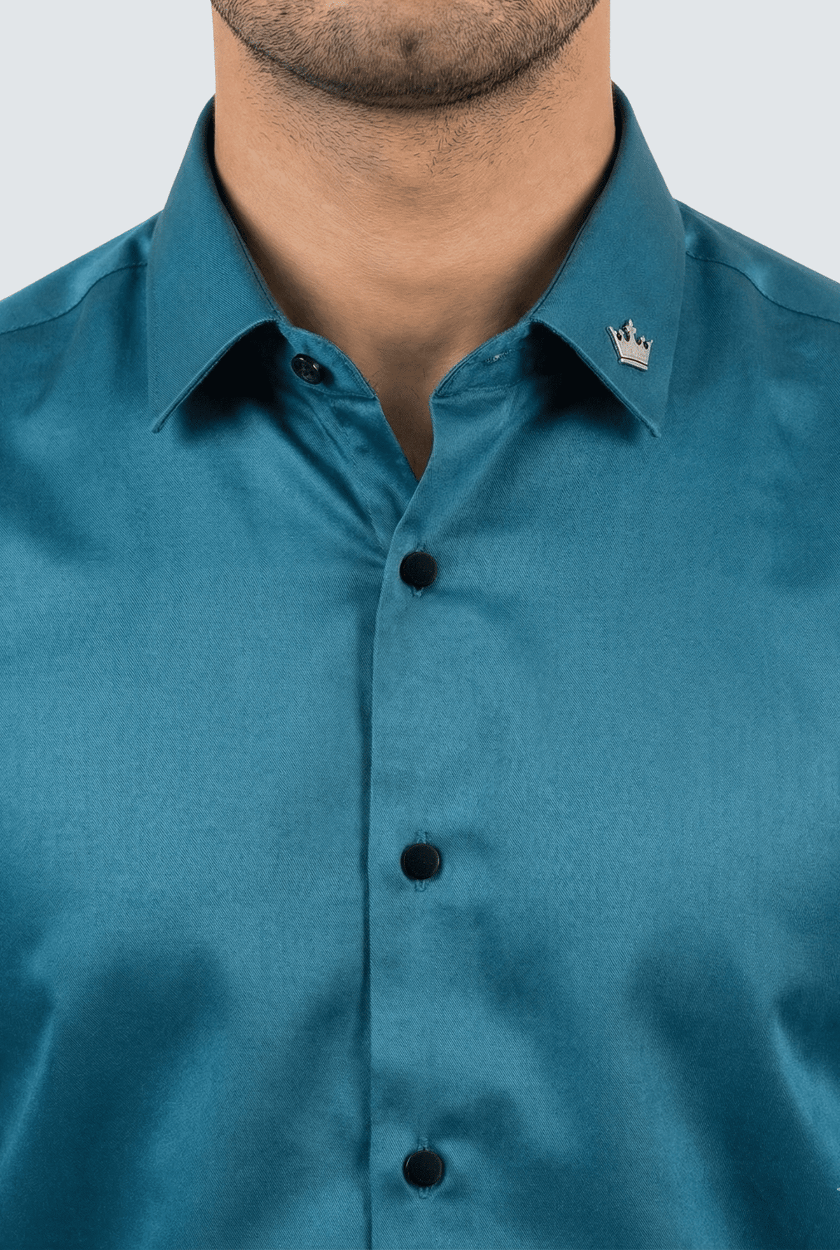 Men's teal satin button-down shirt close-up of collar and front buttons