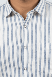 Men's striped cotton button-up shirt detail: point collar and white button placket