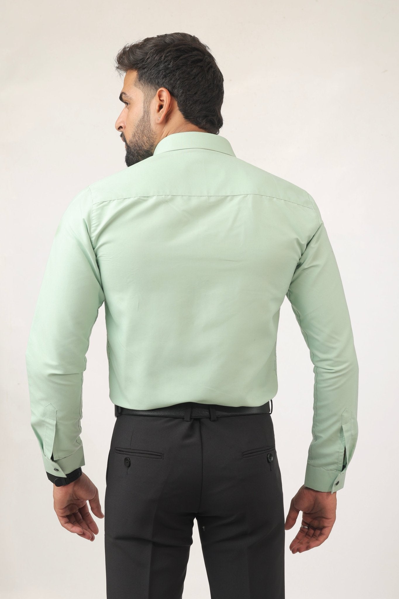 Back profile of mint green shirt – breathable cotton