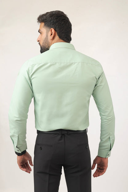 Back profile of mint green shirt – breathable cotton