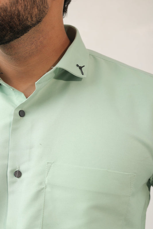 Close-up of mint green fabric – lightweight cotton texture