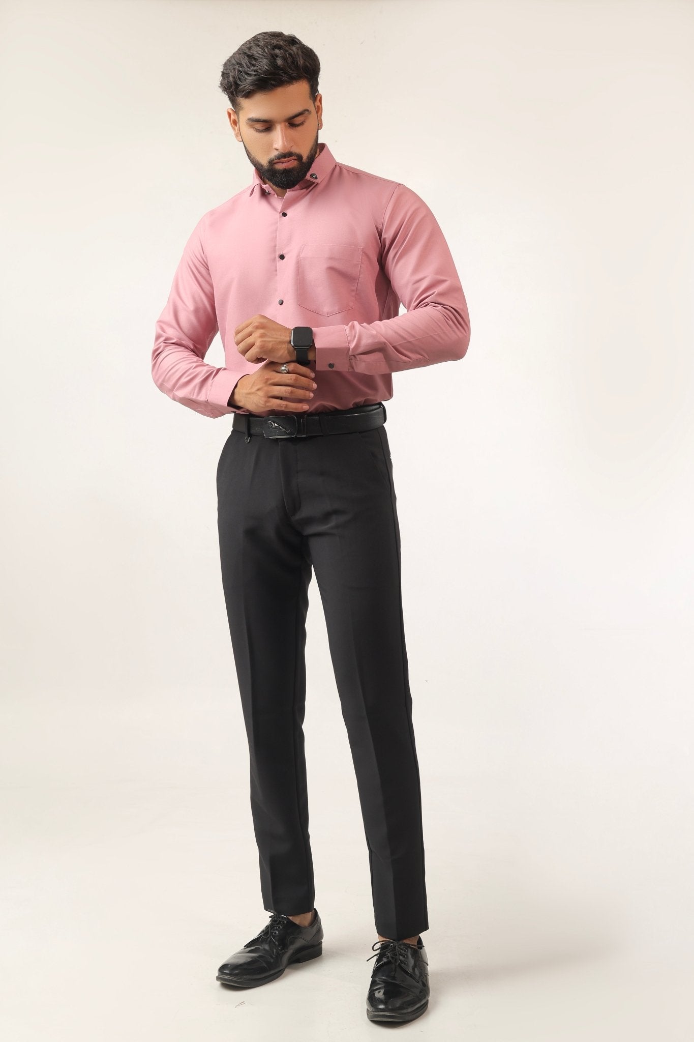 Model wearing pink cotton shirt – casual festive look