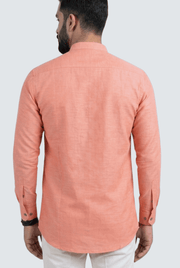 Coral men’s short satin kurta, back view with curved hem and buttoned cuffs