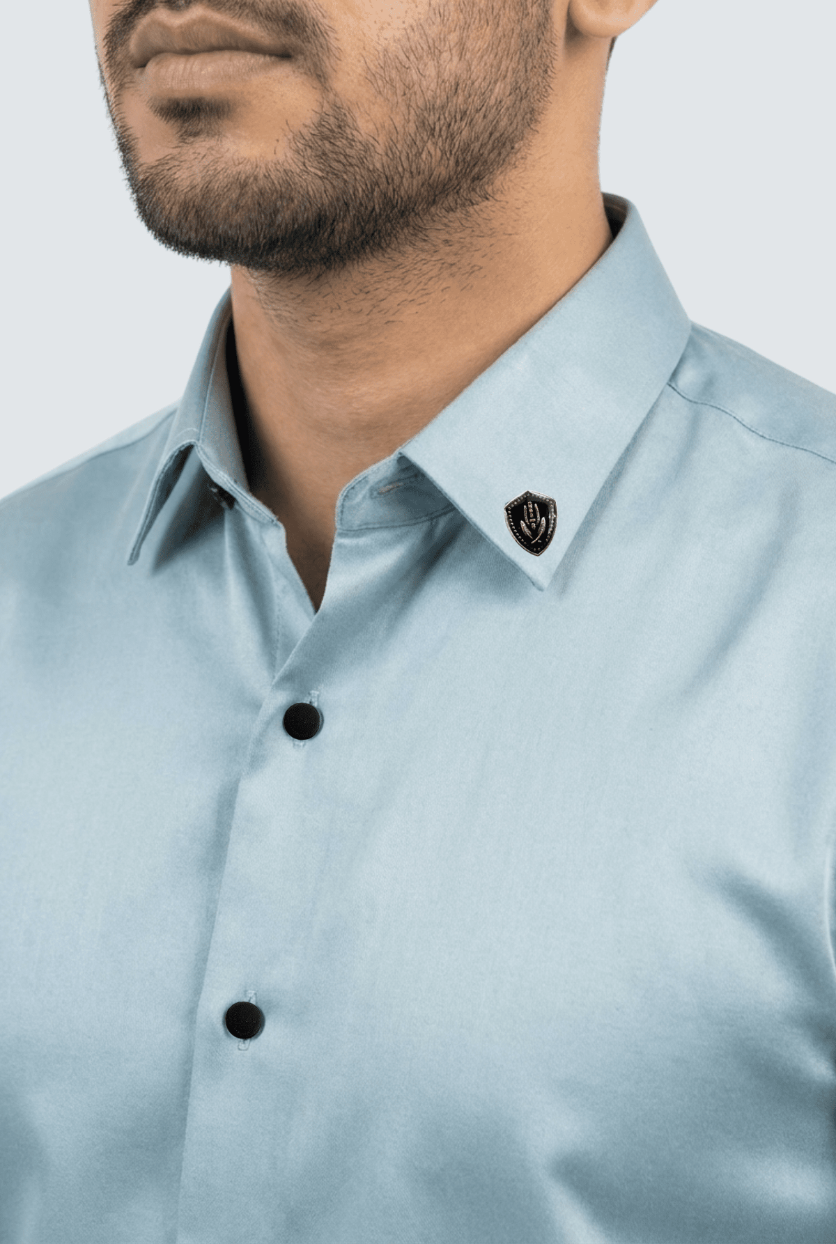 Sky blue satin dress shirt with pointed collar and black button placket
