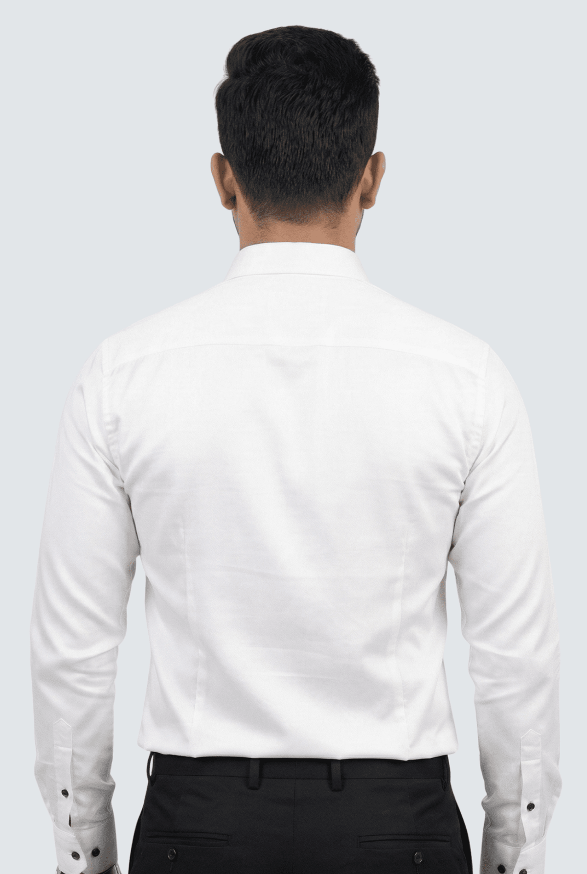 Men's white satin dress shirt back view with buttoned yoke and long sleeves